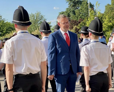 John campion talking to police officer